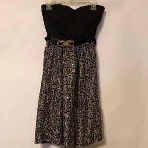 Black and gold mini dress